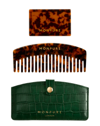 Tortoiseshell patterned comb and mirror with dark green faux leather travel case