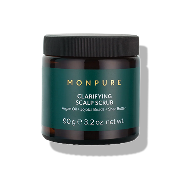 Brown jar of Monpure clarifying scalp scrub with green label and black lid, 90g