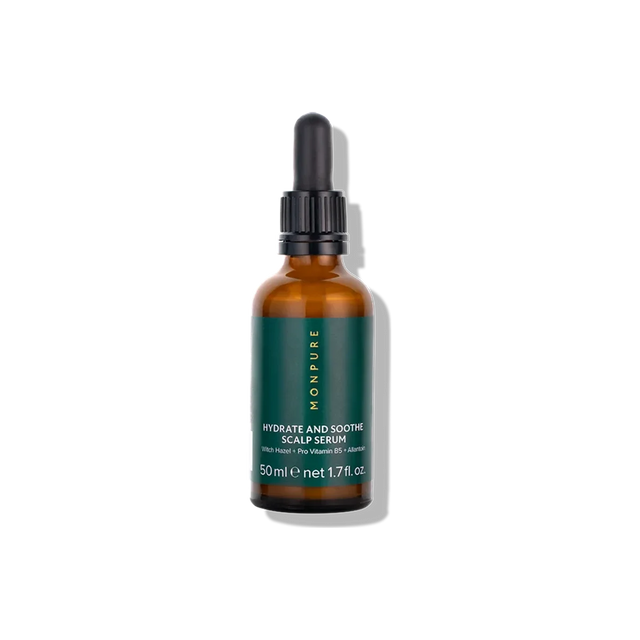 Amber glass bottle with black dropper containing Hydrate and Soothe Scalp Serum with green label