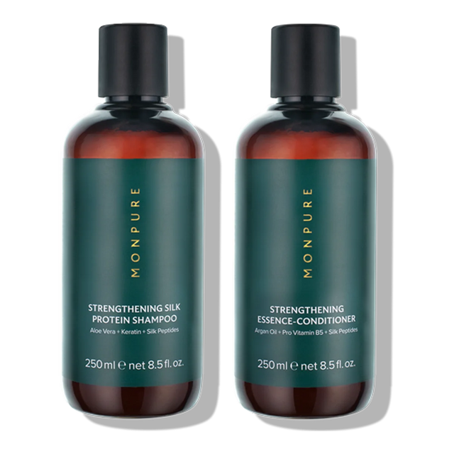 Pair of amber bottles with dark green labels containing strengthening silk protein shampoo and essence conditioner