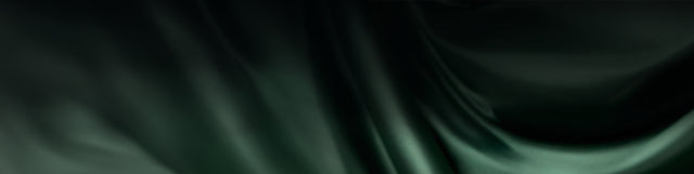Dark green silky fabric with smooth flowing folds and glossy texture