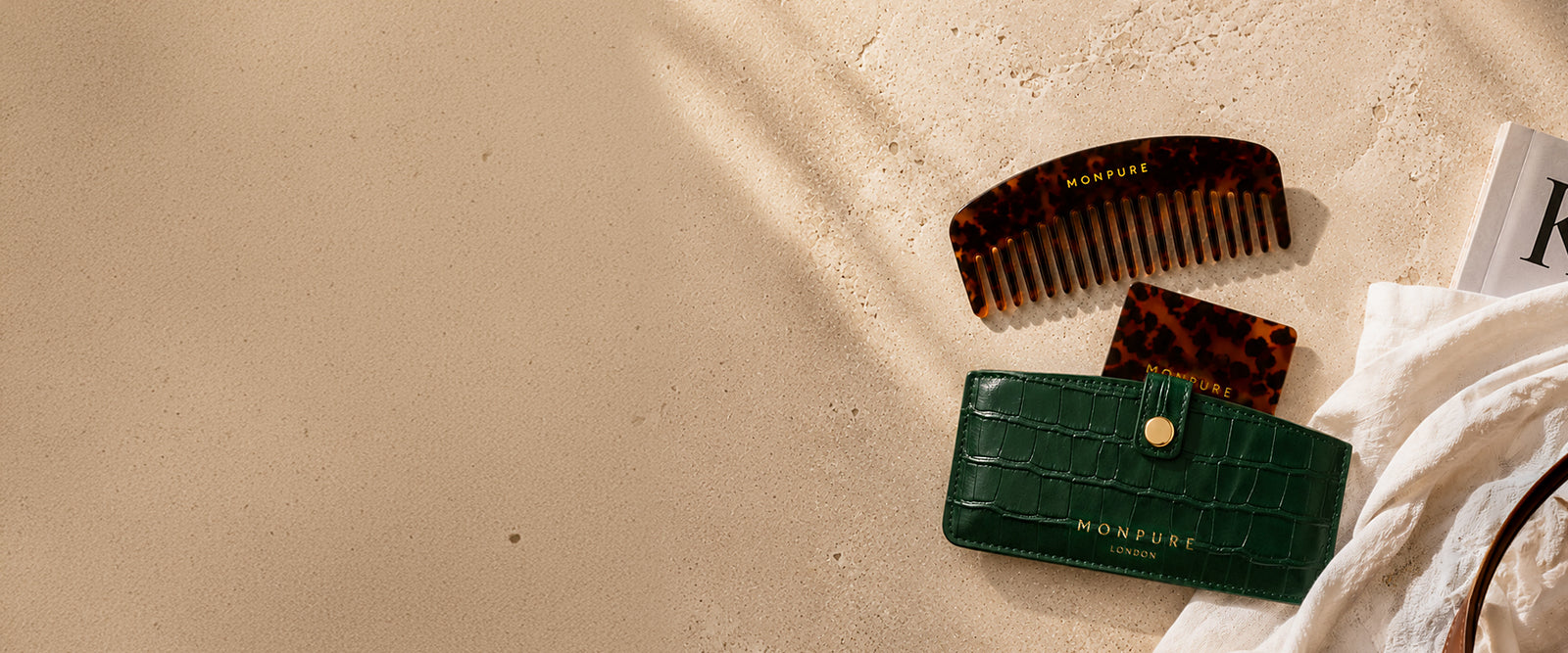 MONPURE Luxury Comb & Mirror Travel Set on travertine stone — free with orders over £100