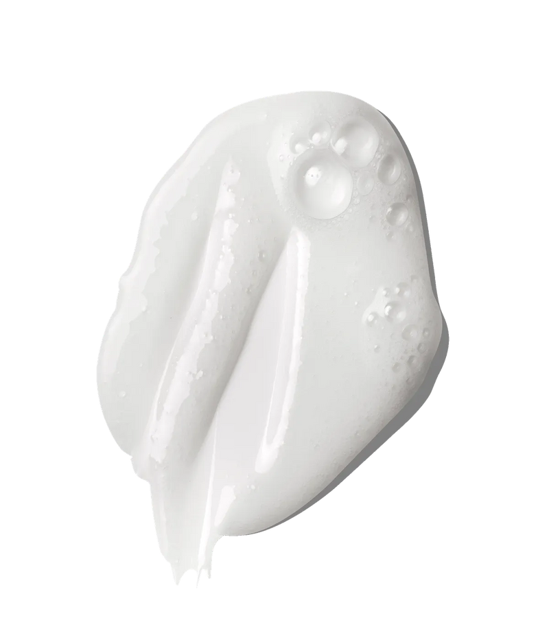 White creamy shampoo texture with bubbles, representing Ceramide Complex Bond Repair Shampoo