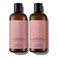 Two brown bottles with pink labels containing Ceramide Complex Bond Repair Shampoo and Conditioner