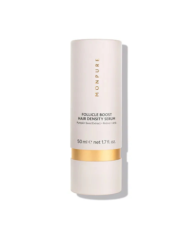 White and gold bottle of Follicle Boost Hair Density Serum with pumpkin seed extract and retinol