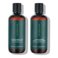 Pair of amber bottles with dark green labels containing strengthening silk protein shampoo and essence conditioner