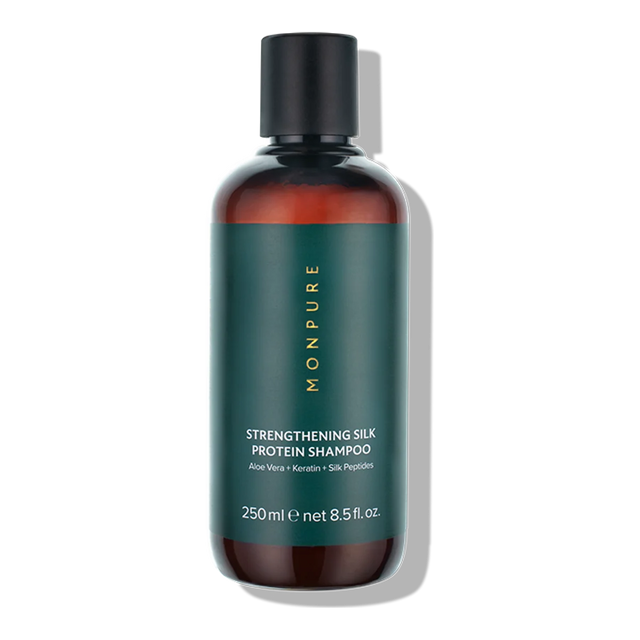 250ml amber bottle of Strengthening Silk Protein Shampoo with green label and black cap