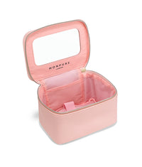 Pink vegan leather beauty case with zipper, interior pockets, and built-in mirror