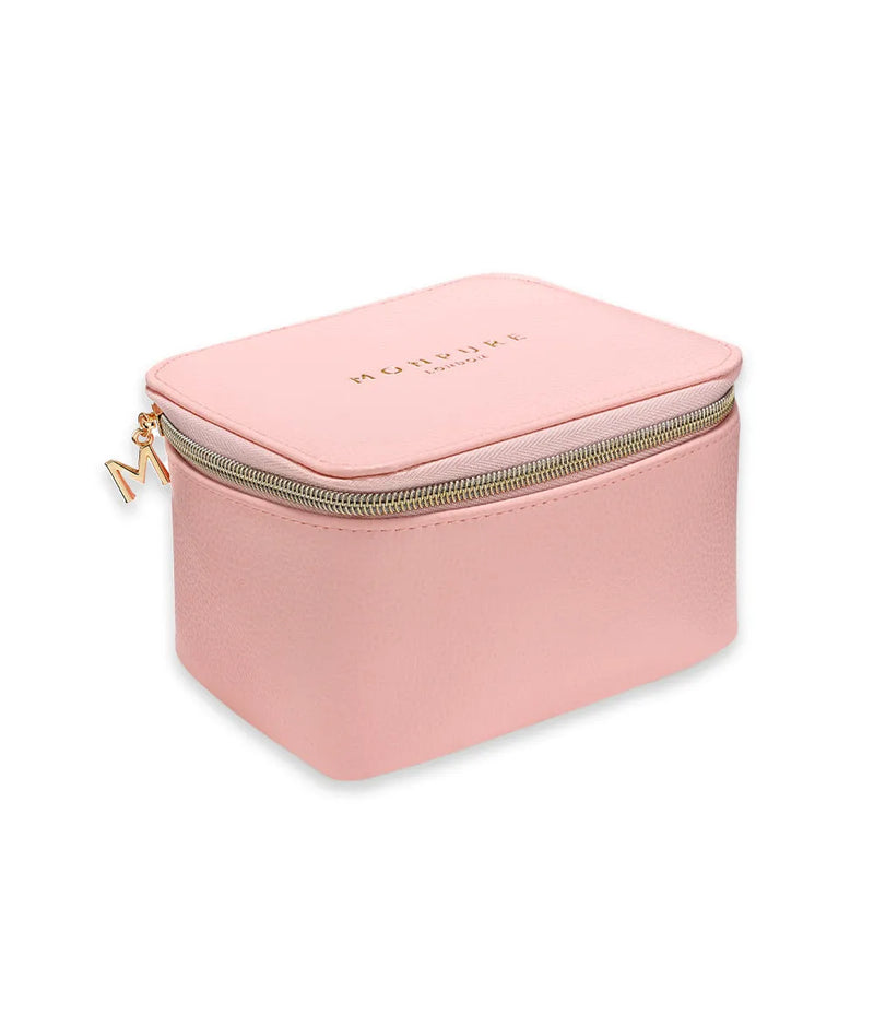 Pink vegan leather beauty case with gold zipper and embossed logo on top