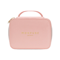 Compact pink vegan leather beauty case with gold zipper and handle